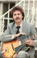 This was taken for an article in the local newspaper around 1984. Much less hair now and the colour has turned many shades lighter. The Guitar looks much the same though.